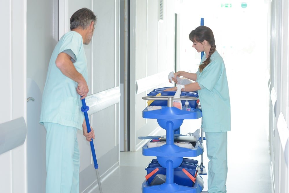 Medical Office Cleaning Team Working In Hospital